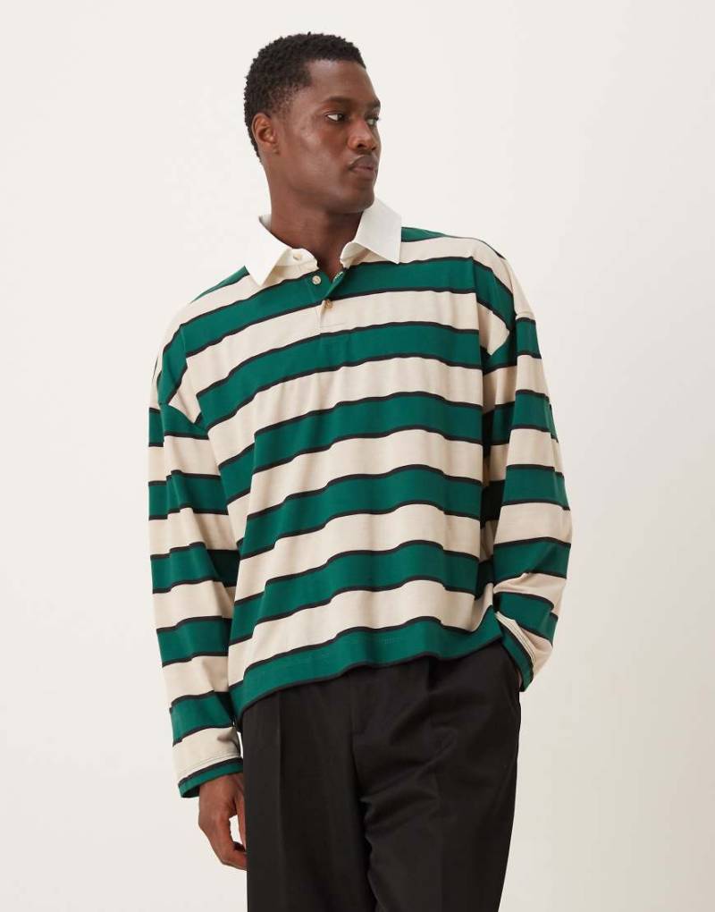 ASOS DESIGN - Kastiges, langärmliges Oversize-Rugbyshirt mit Polokragen, überschnittenen Schultern und Streifen in Grün und Weiß-Bunt von ASOS DESIGN