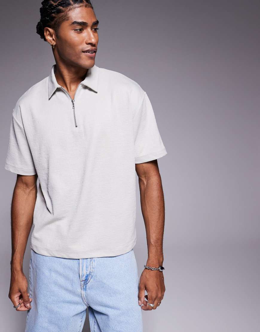 ASOS DESIGN - Kastiges, texturiertes Polohemd in Grau mit Reißverschluss in lockerer Passform von ASOS DESIGN