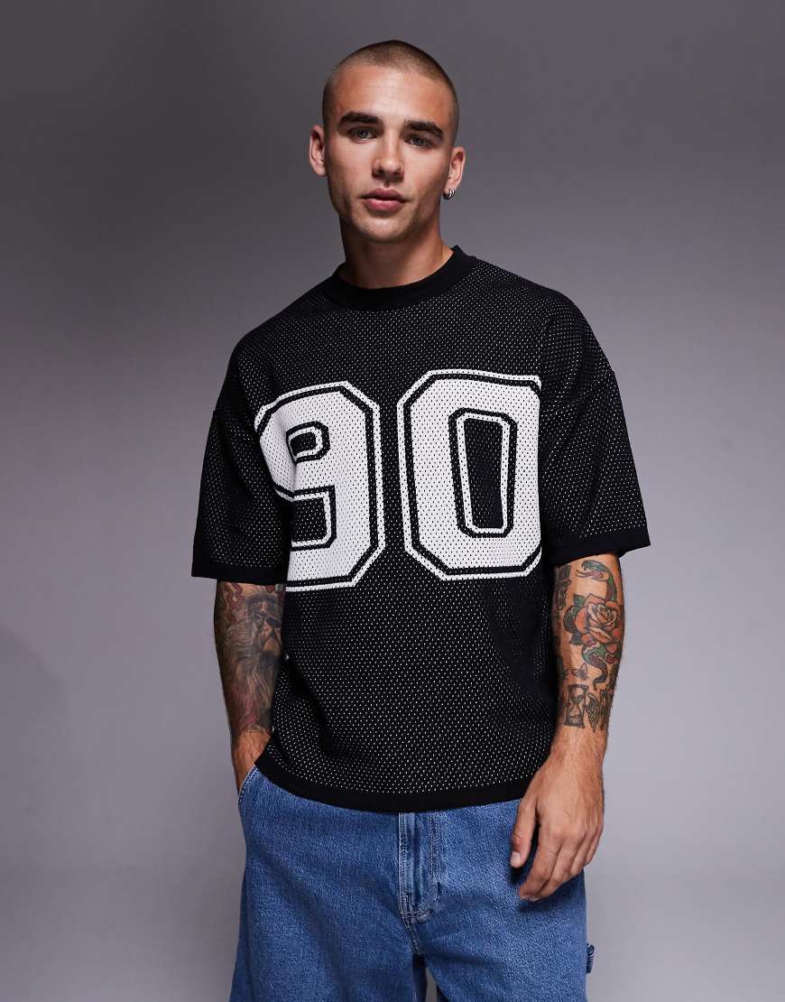ASOS DESIGN - Kastiges Airtex-T-Shirt aus Strick in Schwarz mit Relaxed-Fit und 90-Grafik ASOS DESIGN - Kastiges Airtex-T-Shirt aus Strick in Schwarz mit Relaxed-Fit und 90-Grafik von ASOS DESIGN
