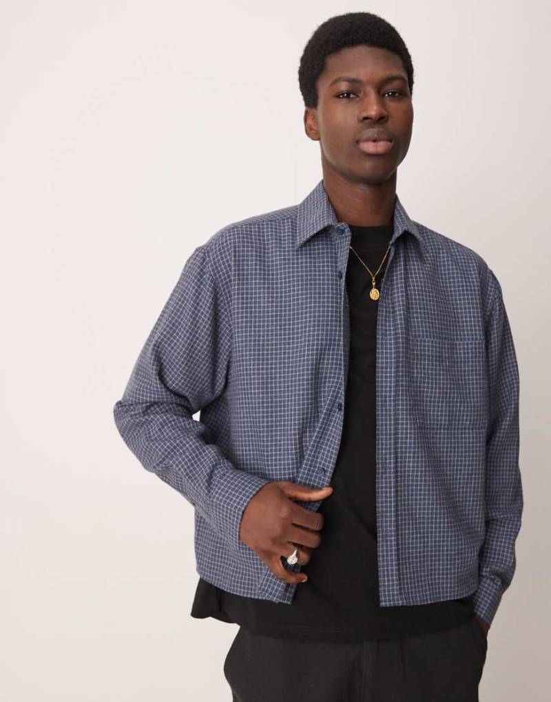 ASOS DESIGN - Kastiges Oversize-Flanellhemd in kariertem Blau von ASOS DESIGN