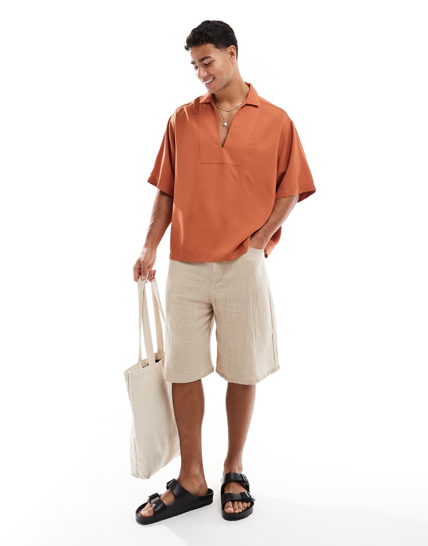 ASOS DESIGN - Kastiges Oversize-Schlupfhemd in Rostrot mit offenem Saum-Braun von ASOS DESIGN