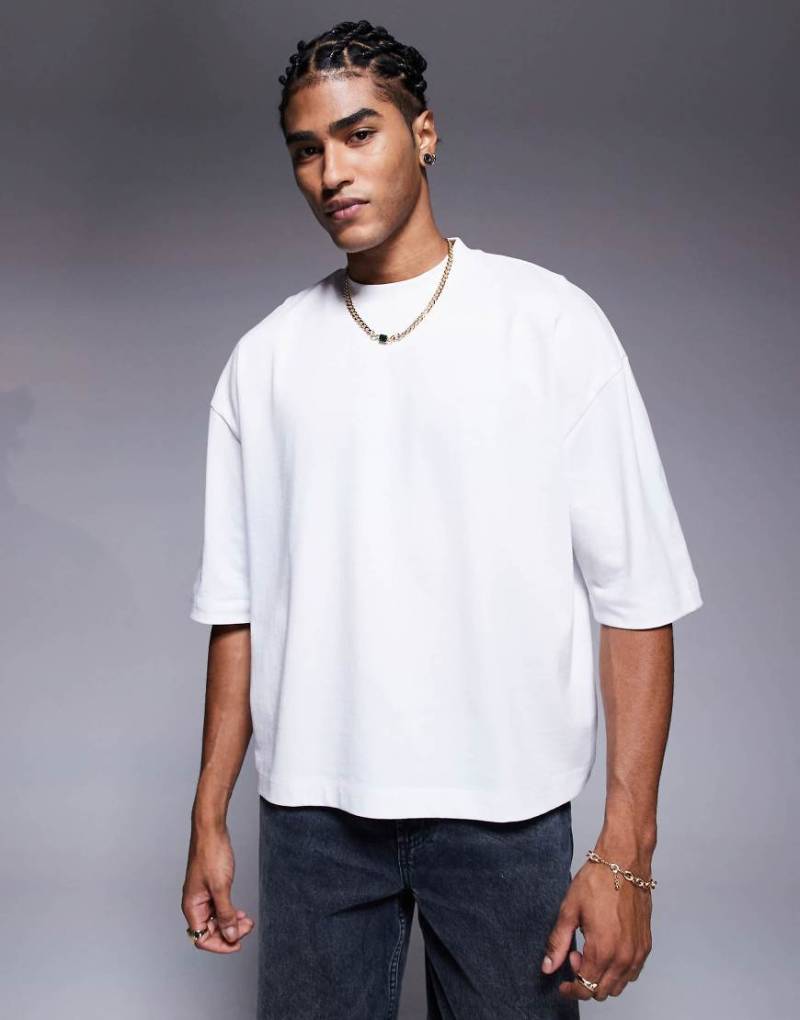 ASOS DESIGN - Kastiges Oversize-T-Shirt aus schwerem Material in Weiß mit Halbärmeln von ASOS DESIGN