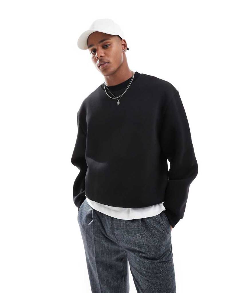 ASOS DESIGN - Kastiges Oversize-Sweatshirt aus schwerem, neoprenartigem Material in Schwarz von ASOS DESIGN
