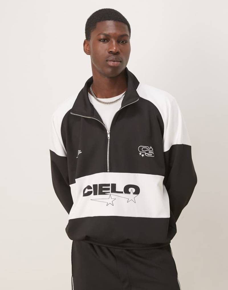 ASOS DESIGN - Kastiges Oversize-Sweatshirt aus neoprenartigem Material in Schwarz mit Stehkragen und Aufdruck, Kombiteil ASOS DESIGN - Kastiges Oversize-Sweatshirt aus neoprenartigem Material in Schwarz mit Stehkragen und Aufdruck, Kombiteil von ASOS DESIGN