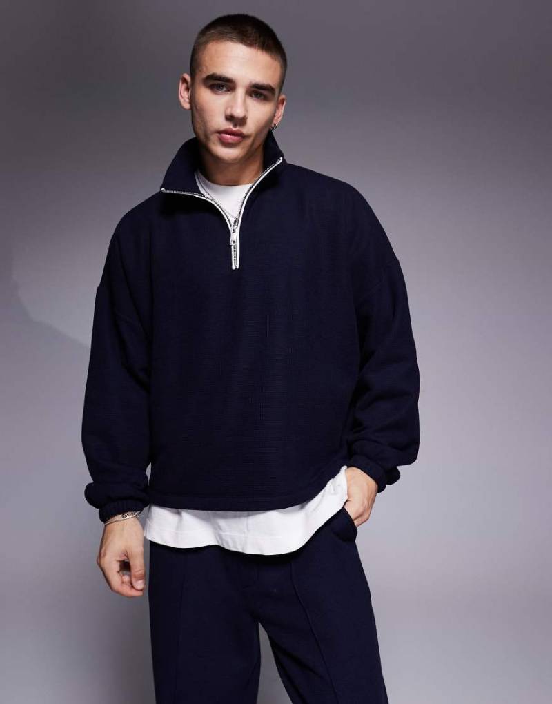 ASOS DESIGN - Kastiges Oversize-Sweatshirt aus schwerem Material in Marineblau mit überschnittenen Schultern und halblangem Reißverschluss, Kombiteil von ASOS DESIGN