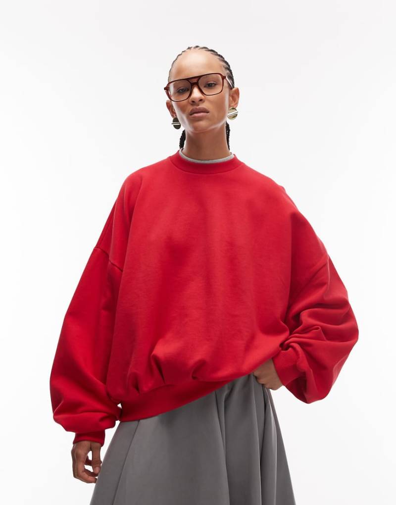 ASOS DESIGN - Kastiges Oversize-Sweatshirt in Rot von ASOS DESIGN