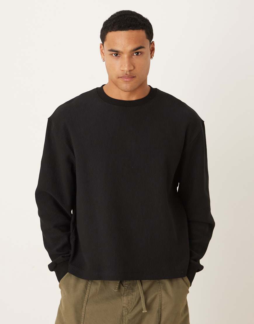 ASOS DESIGN - Kastiges Sweatshirt in Schwarz mit lockerem Schnitt und Rippenstruktur von ASOS DESIGN