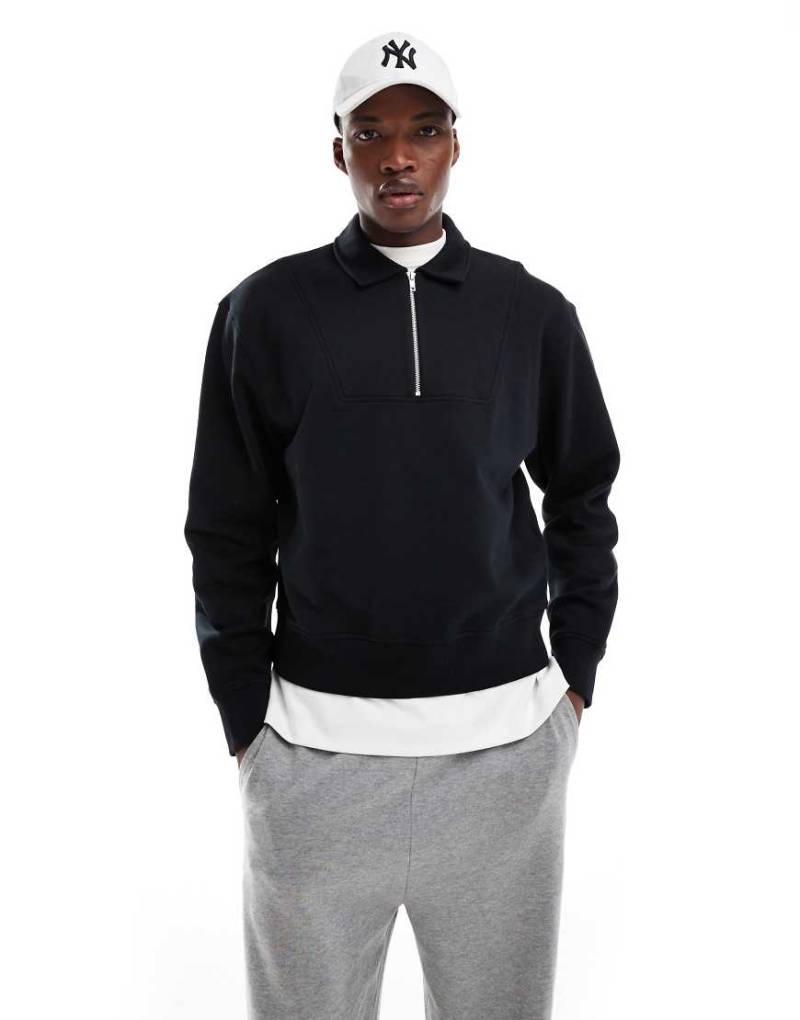 ASOS DESIGN - Boxy Fit Oversize-Sweatshirt in Schwarz mit kurzem Reißverschluss von ASOS DESIGN