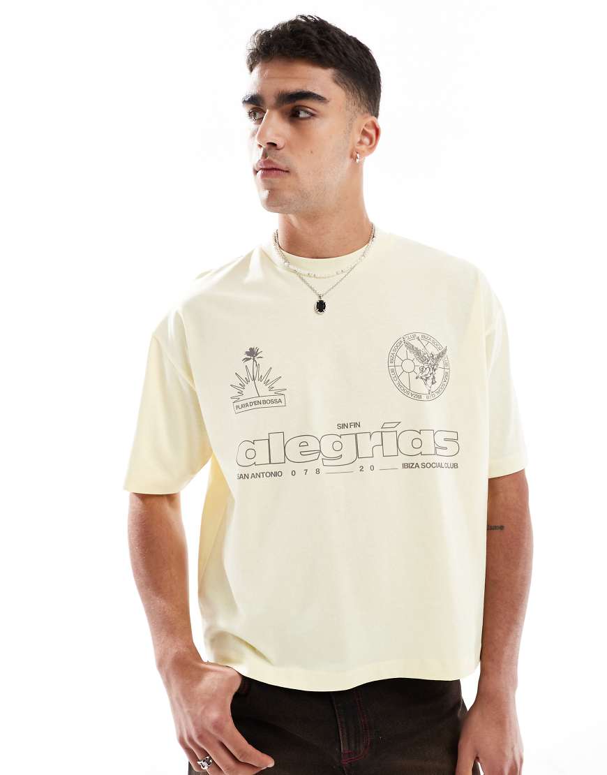 ASOS DESIGN - Kastiges Oversize-T-Shirt aus 240 g/m² schwerem Material in Buttercreme mit Sport-Grafikprint-Neutral von ASOS DESIGN