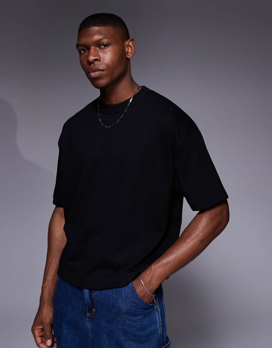 ASOS DESIGN - Weiches, kastiges Oversize-T-Shirt in Schwarz ASOS DESIGN - Weiches, kastiges Oversize-T-Shirt in Schwarz von ASOS DESIGN