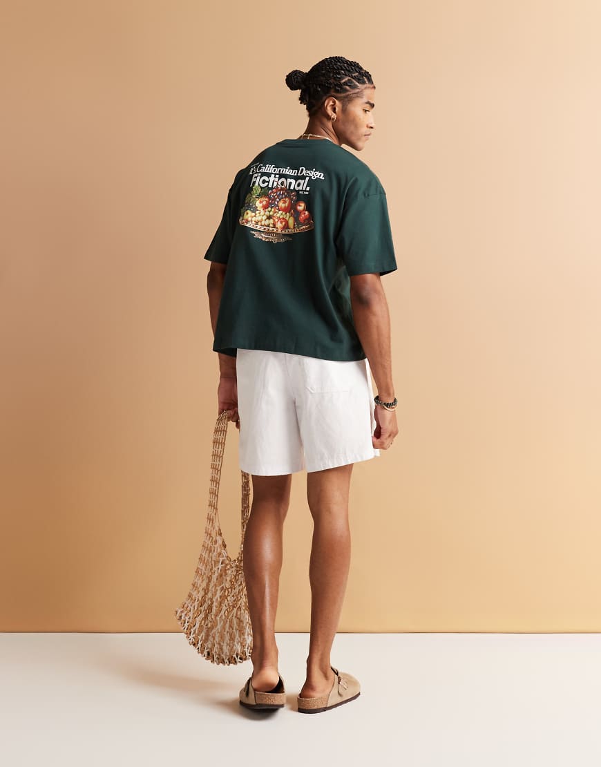 ASOS DESIGN - Kastiges Oversize-T-Shirt in Dunkelgrün mit Früchte-Print von ASOS DESIGN