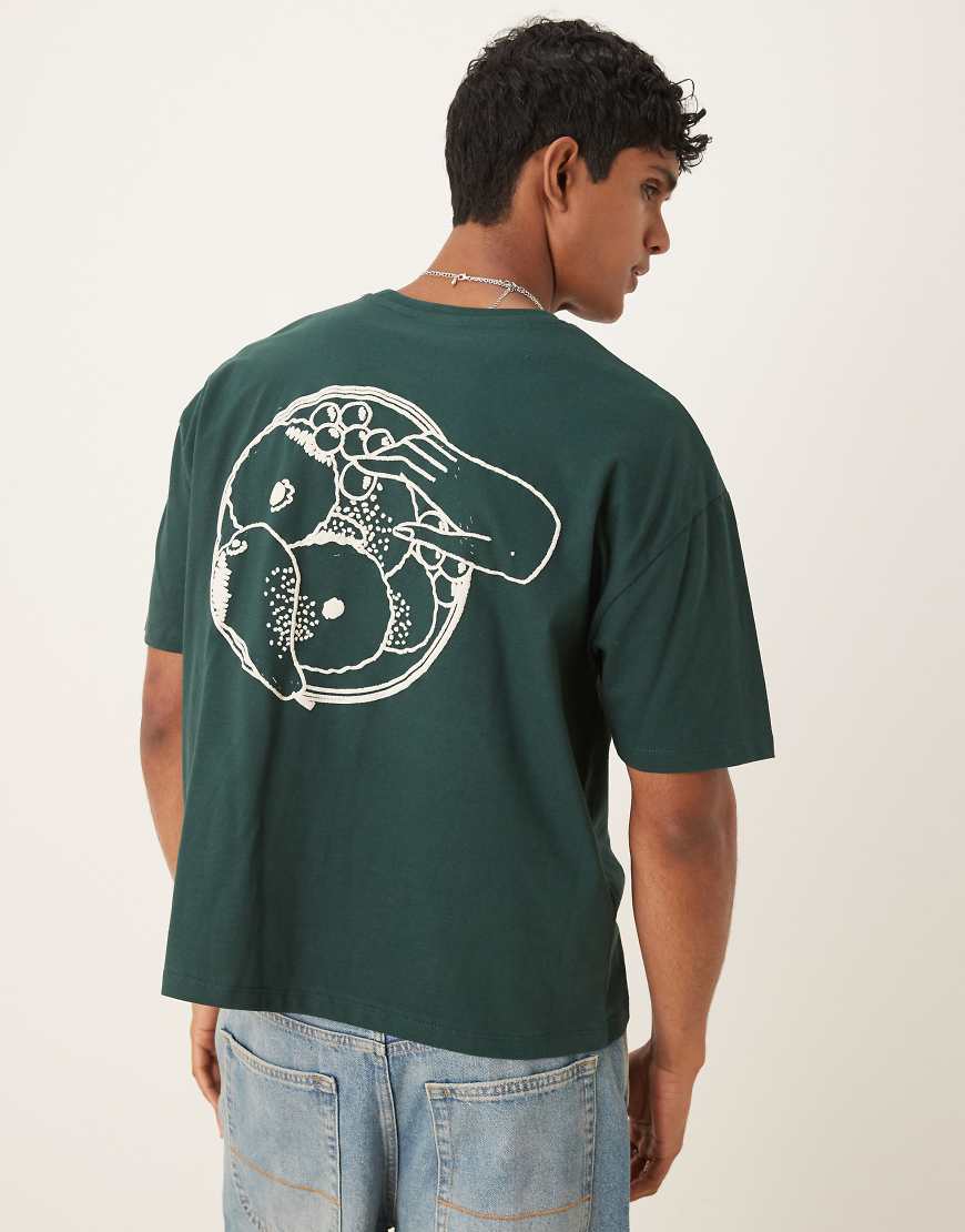 ASOS DESIGN - Kastiges Oversize-T-Shirt in Dunkelgrün mit Sommer-Print von ASOS DESIGN