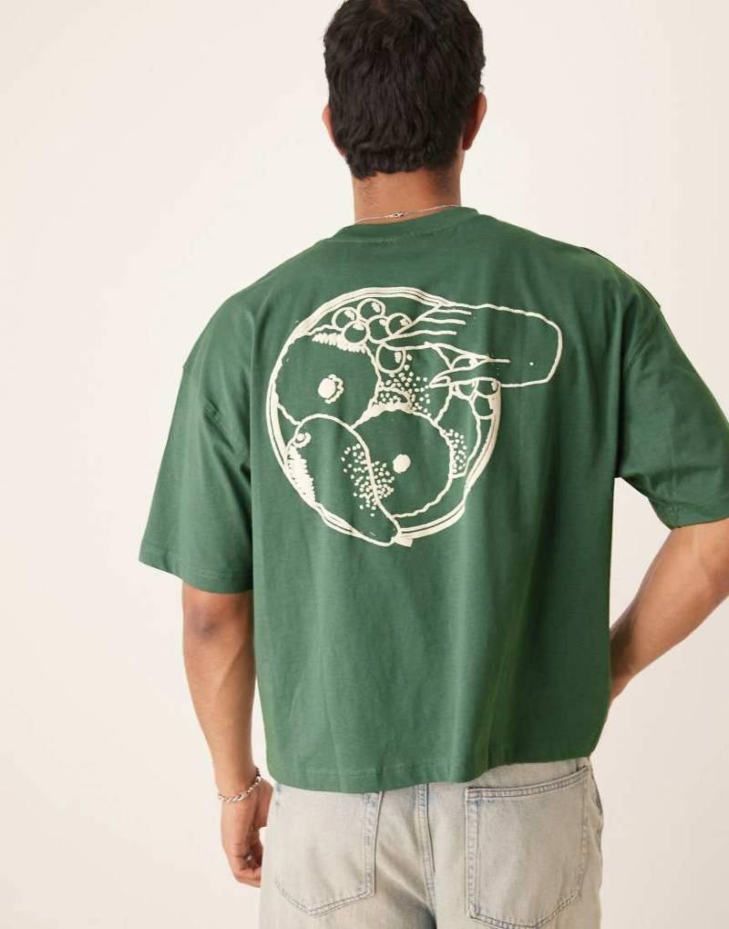 ASOS DESIGN - Kastiges Oversize-T-Shirt in Grün mit Sommergrafik von ASOS DESIGN