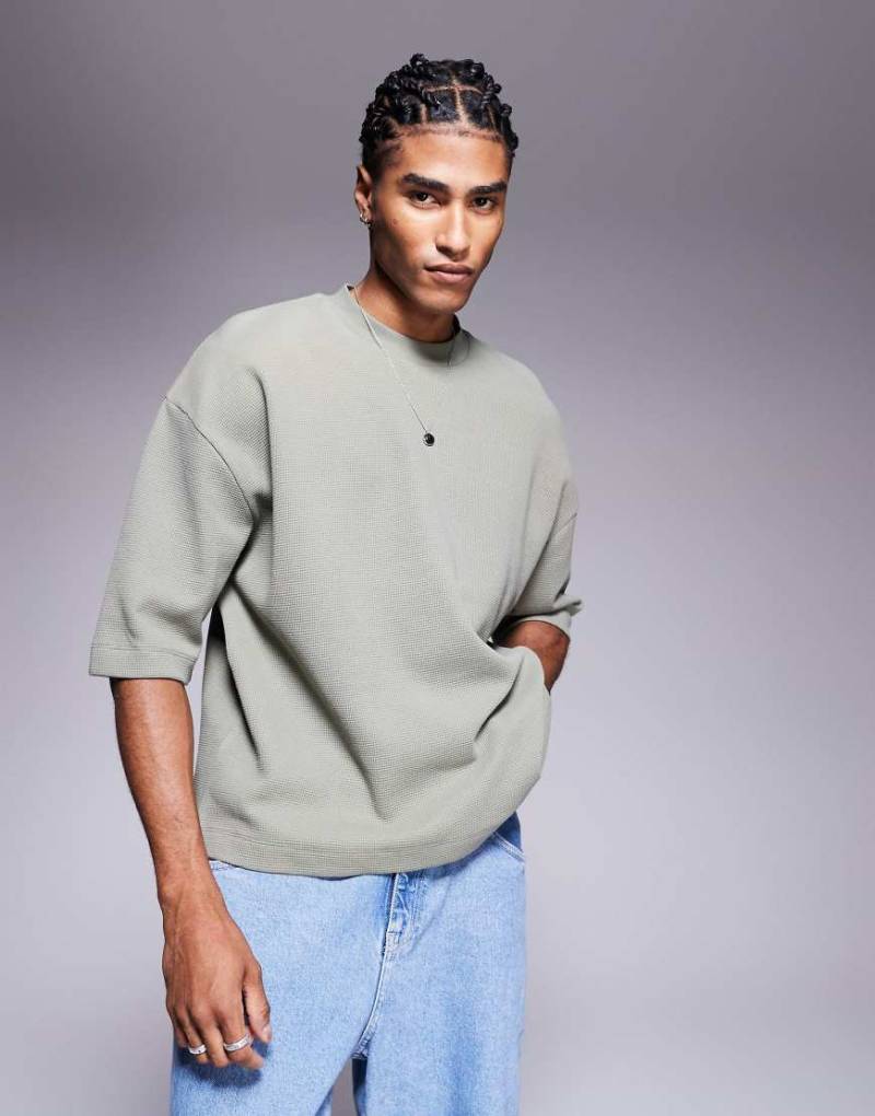 ASOS DESIGN - Kastiges Oversize-T-Shirt in Khaki mit halblangen Ärmeln und Waffelstruktur-Grün von ASOS DESIGN