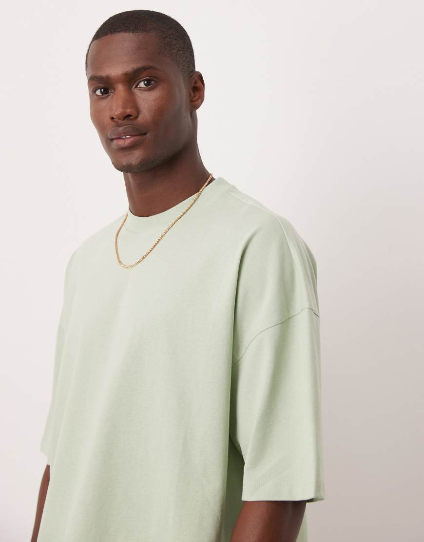 ASOS DESIGN - Kastiges Oversize-T-Shirt in Mintgrün mit überschnittenen Schultern von ASOS DESIGN