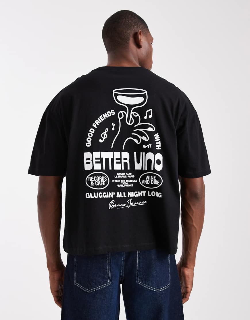 ASOS DESIGN - Kastiges Oversize-T-Shirt in Schwarz mit „Vino"-Grafikprint ASOS DESIGN - Kastiges Oversize-T-Shirt in Schwarz mit „Vino"-Grafikprint von ASOS DESIGN