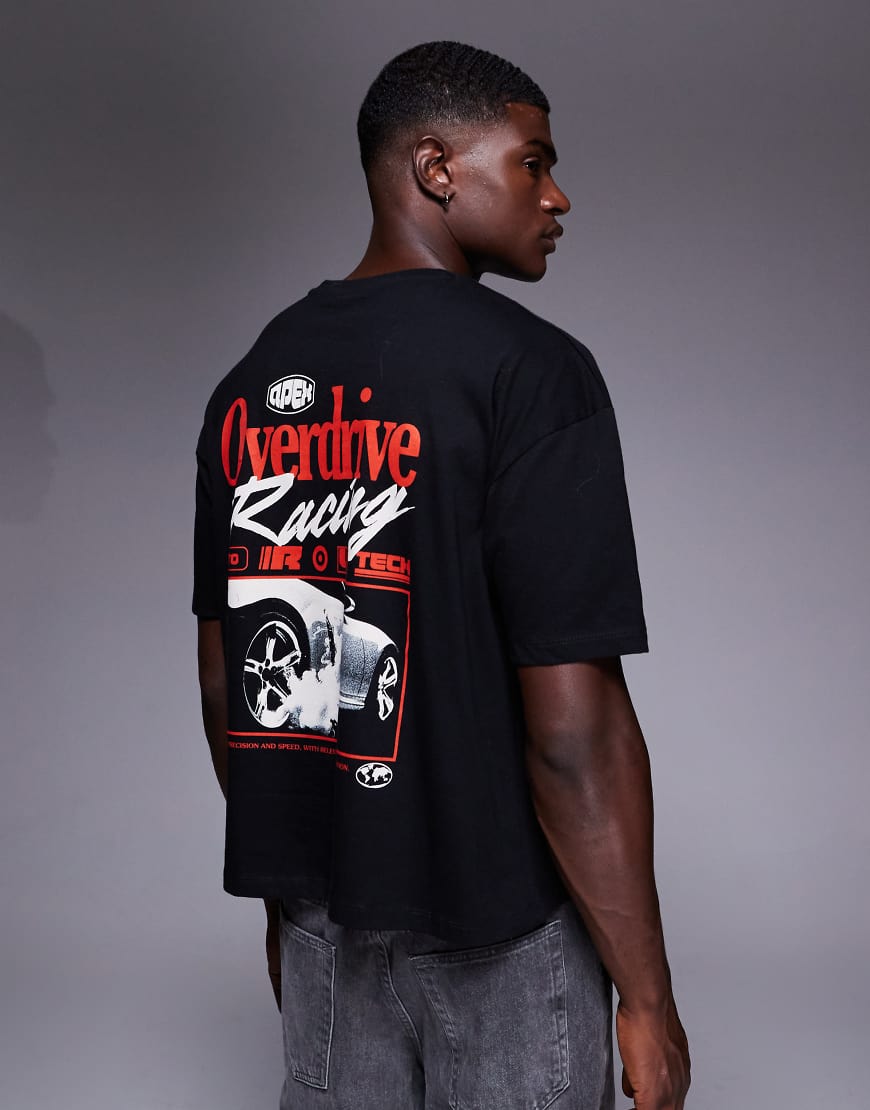 ASOS DESIGN - Kastiges Oversize-T-Shirt in Schwarz mit Auto-Grafik ASOS DESIGN - Kastiges Oversize-T-Shirt in Schwarz mit Auto-Grafik von ASOS DESIGN