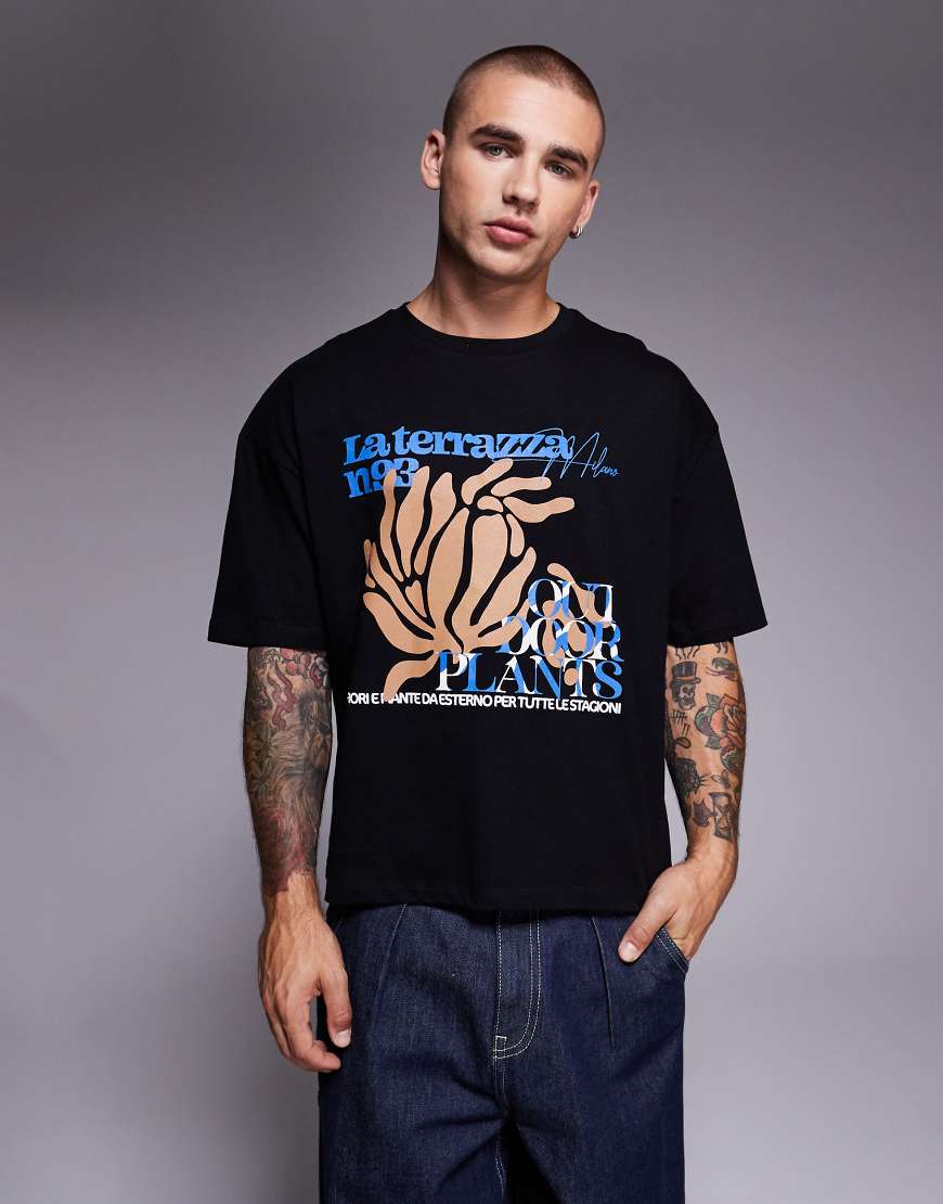 ASOS DESIGN - Kastiges Oversize-T-Shirt in Schwarz mit Blumen-Print von ASOS DESIGN