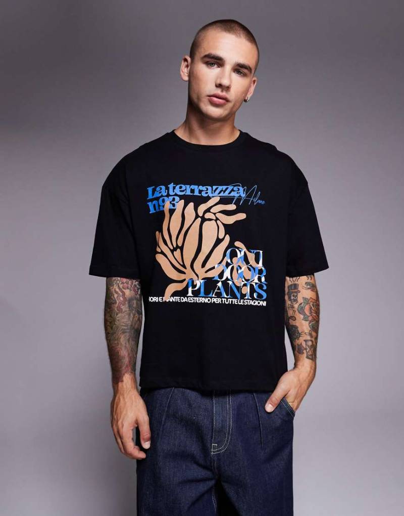 ASOS DESIGN - Kastiges Oversize-T-Shirt in Schwarz mit Blumen-Print von ASOS DESIGN