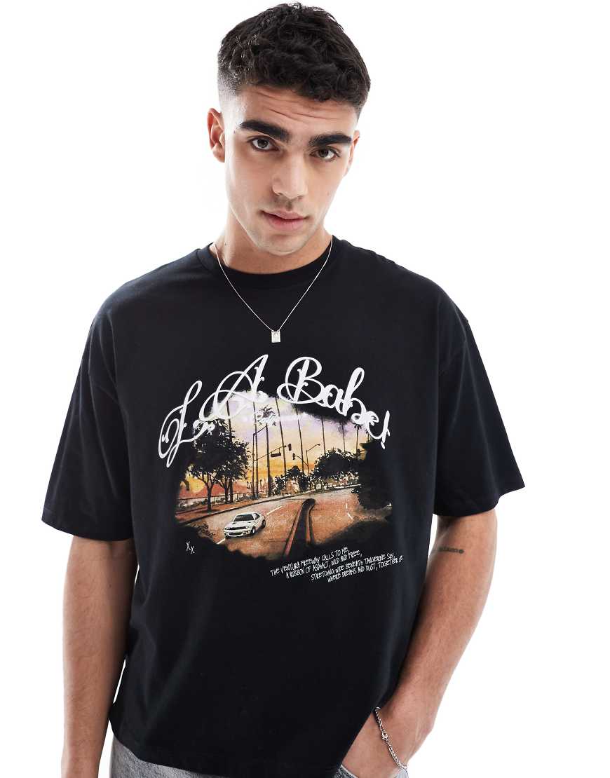 ASOS DESIGN - Kastiges Oversize-T-Shirt in Schwarz mit Landschaftsgrafik-Print ASOS DESIGN - Kastiges Oversize-T-Shirt in Schwarz mit Landschaftsgrafik-Print von ASOS DESIGN