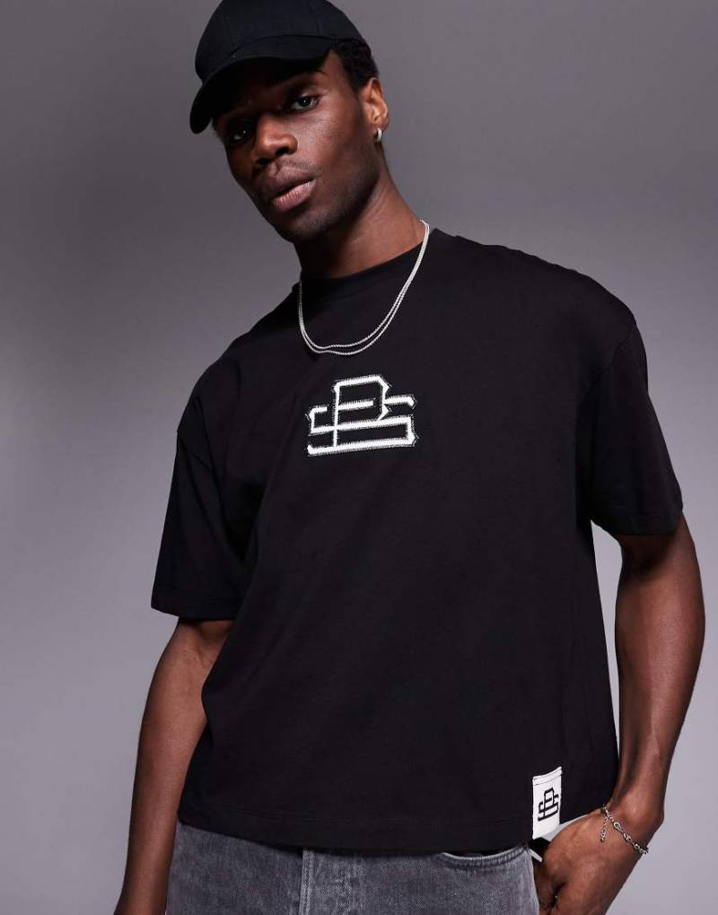 ASOS DESIGN - Kastiges Oversize-T-Shirt in Schwarz mit Logo-Applikation auf der Brust-Grau von ASOS DESIGN