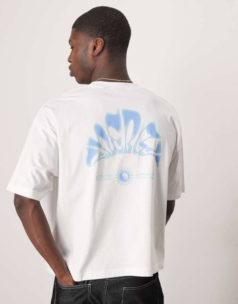 ASOS DESIGN - Kastiges Oversize-T-Shirt in Weiß mit Himmelskörper-Grafik von ASOS DESIGN