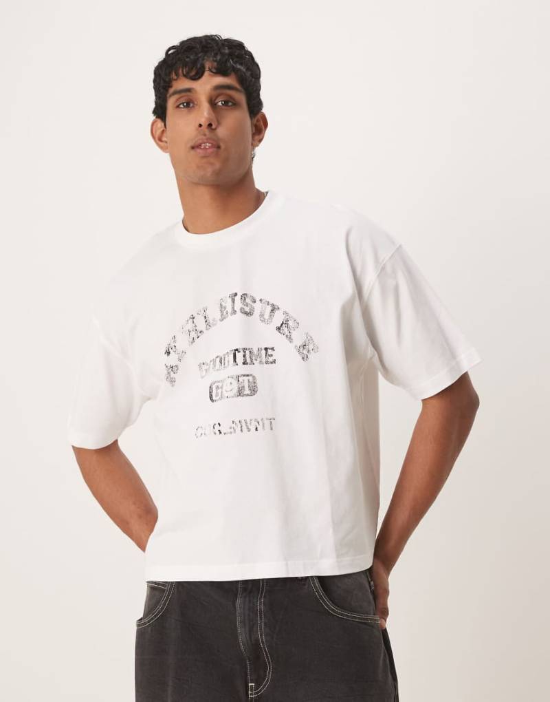 ASOS DESIGN - Kastiges Oversize-T-Shirt in Weiß mit Sport-Grafikprint von ASOS DESIGN