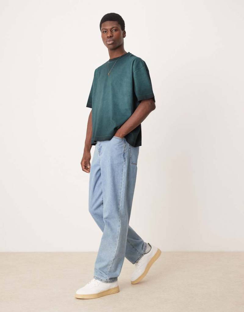 ASOS DESIGN - Kastiges Oversize-T-Shirt in verwaschenem Grün mit Pigmentfärbung von ASOS DESIGN