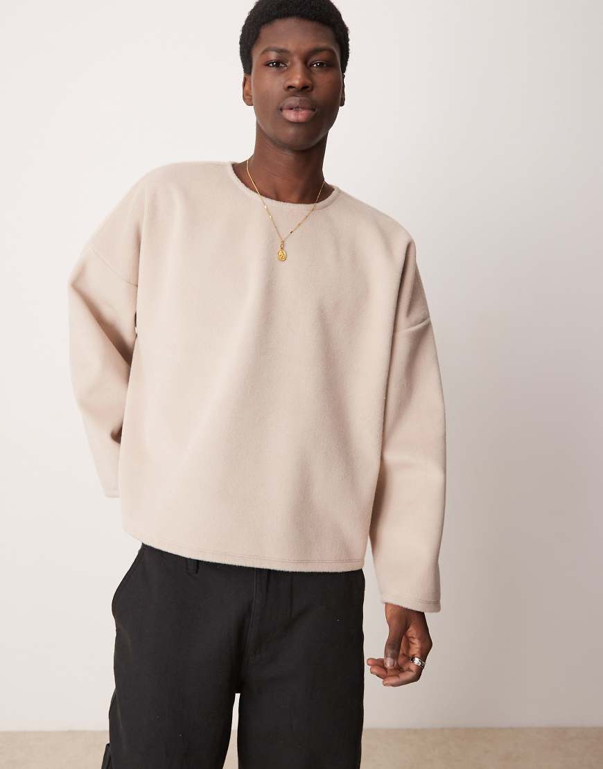 ASOS DESIGN - Kastiges Super-Oversize-Sweatshirt aus strukturiertem Fleece in Beige-Weiß von ASOS DESIGN