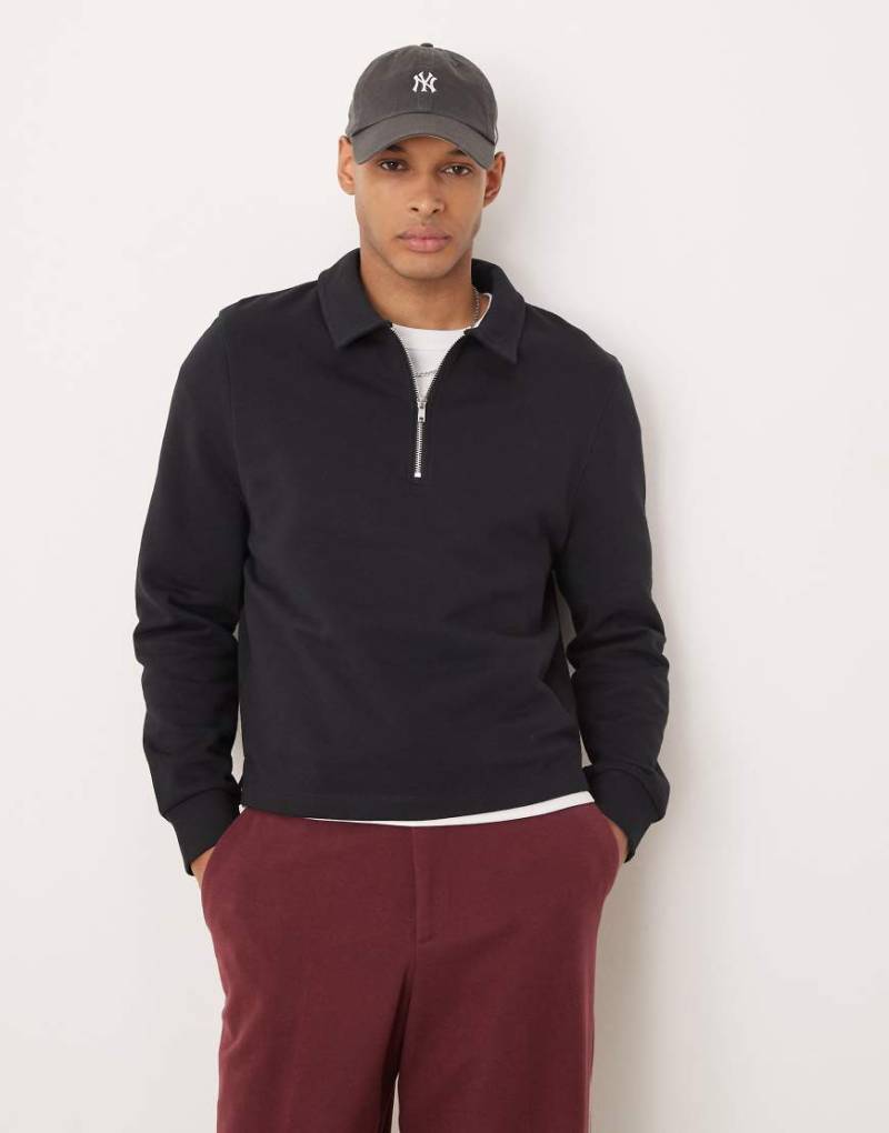 ASOS DESIGN - Kastiges Oversize-Sweatshirt in Schwarz mit kurzem Reißverschluss von ASOS DESIGN