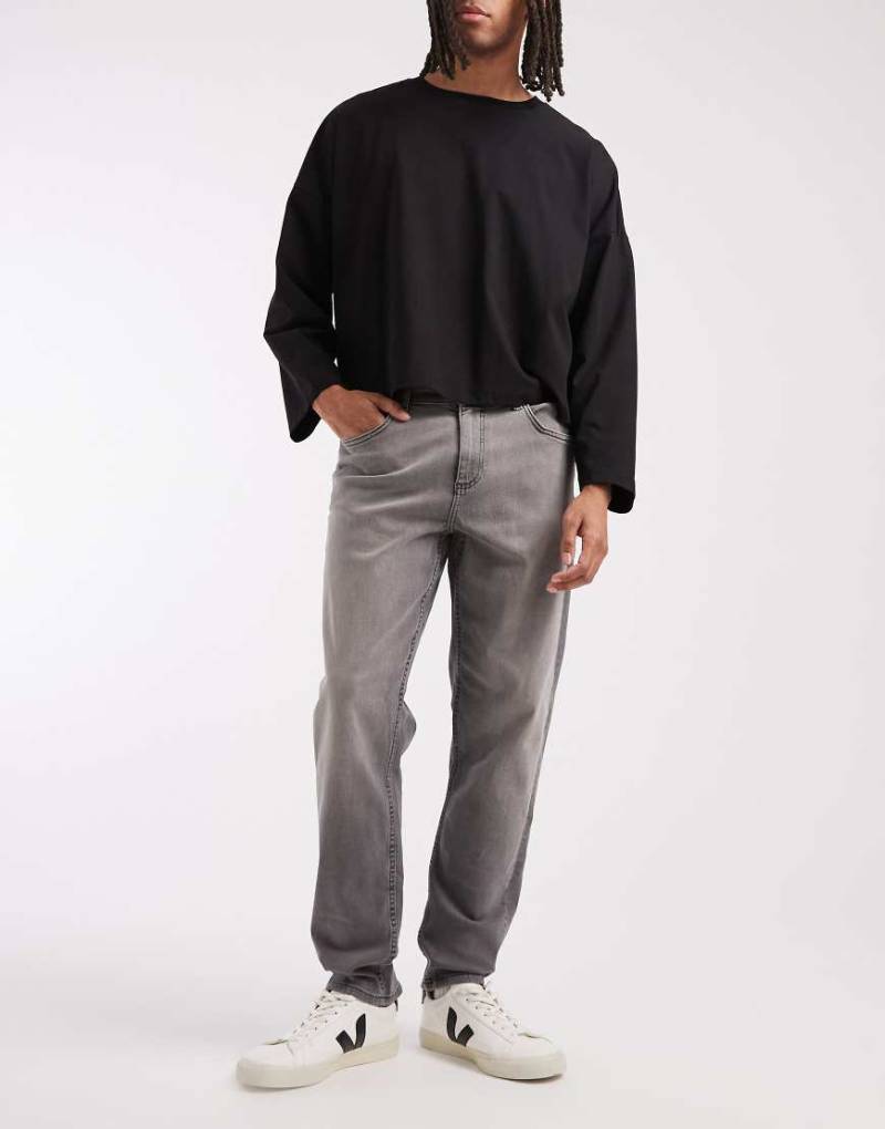 ASOS DESIGN - Schmal zulaufende Stretch-Jeans in Grau von ASOS DESIGN