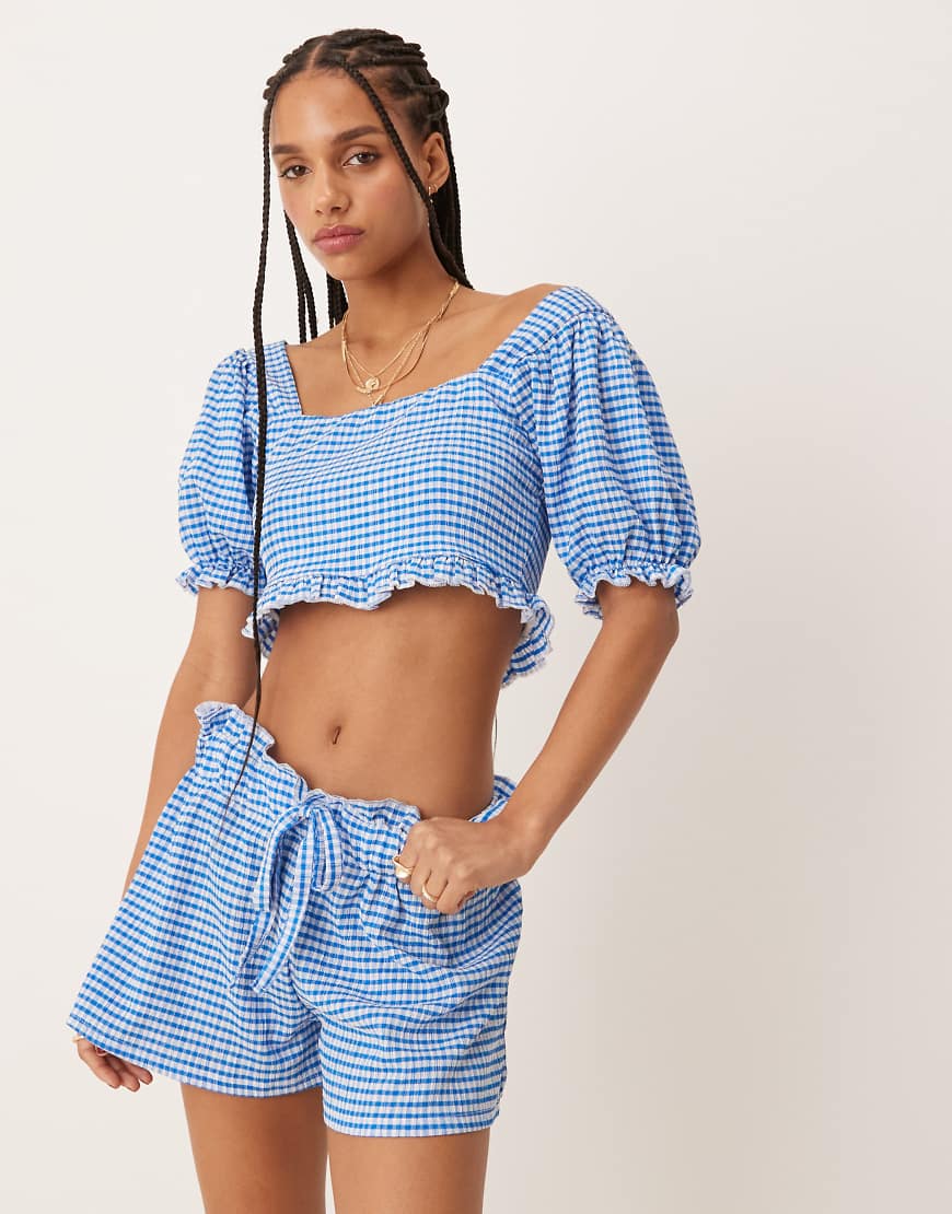 ASOS DESIGN - Knappe Shorts mit hellblauem Vichy-Karomuster, Kombiteil ASOS DESIGN - Knappe Shorts mit hellblauem Vichy-Karomuster, Kombiteil von ASOS DESIGN
