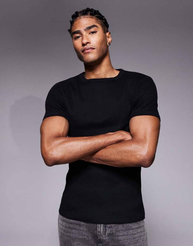 ASOS DESIGN - Körperbetontes, geripptes T-Shirt aus superschwerem Material in Schwarz von ASOS DESIGN