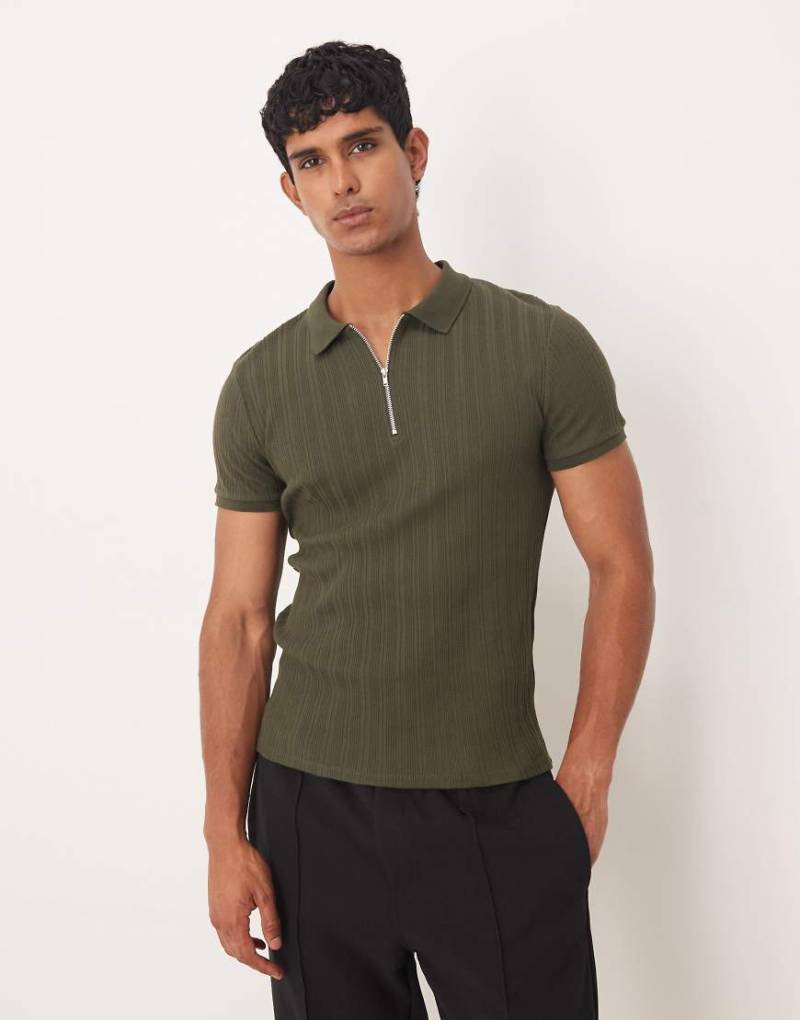 ASOS DESIGN - Körperbetontes Polohemd in Khaki mit Reißverschluss und gerippter Struktur-Grün von ASOS DESIGN