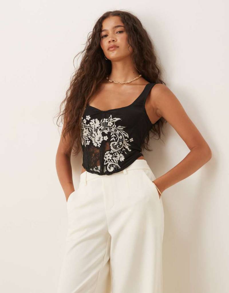 ASOS DESIGN - Korsett-Oberteil aus bestickter Spitze in Schwarz ASOS DESIGN - Korsett-Oberteil aus bestickter Spitze in Schwarz von ASOS DESIGN
