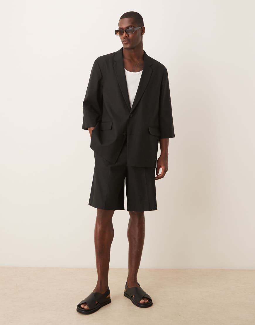 ASOS DESIGN - Kurzärmlige Anzugjacke aus Leinenmix in Schwarz ASOS DESIGN - Kurzärmlige Anzugjacke aus Leinenmix in Schwarz von ASOS DESIGN