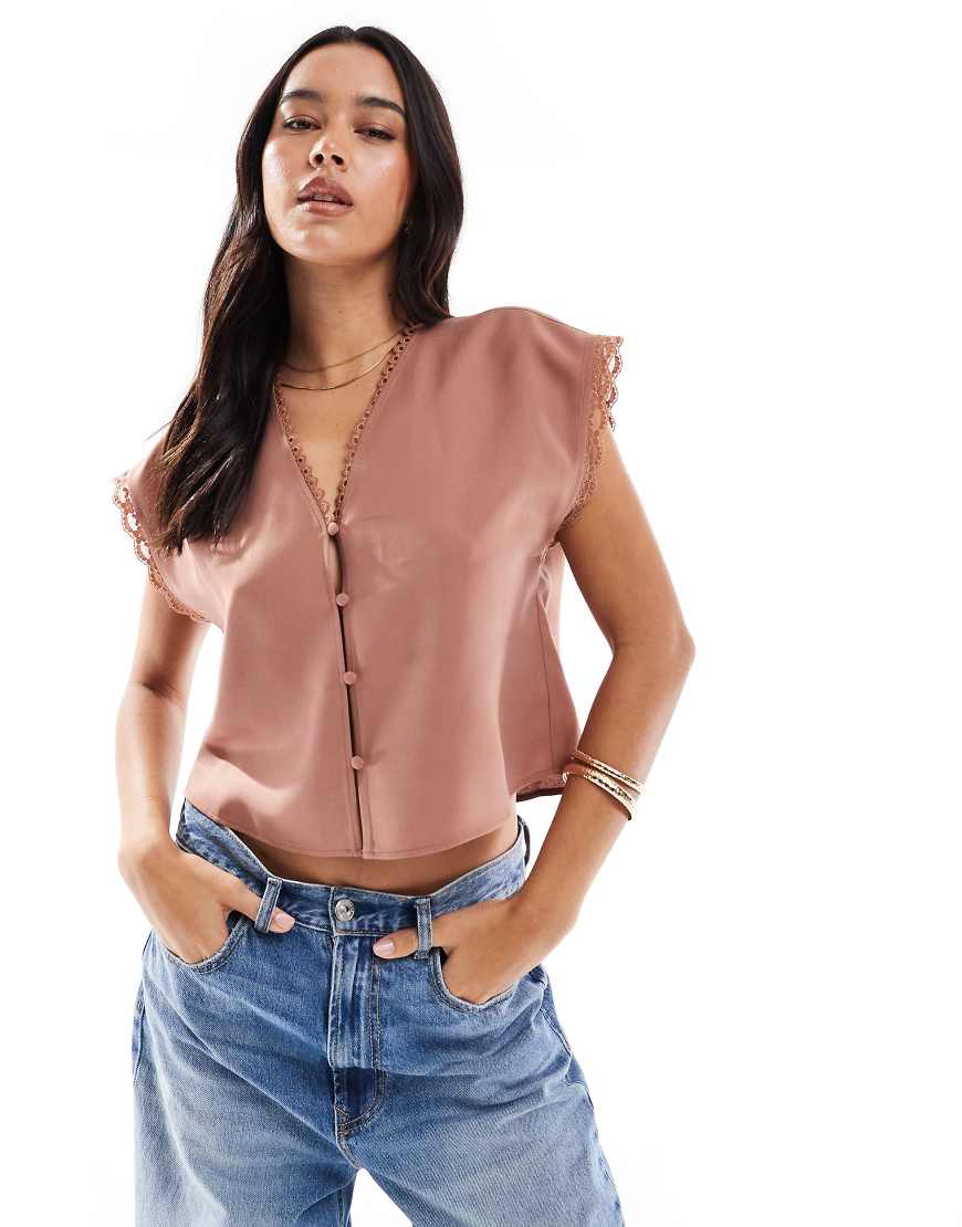 ASOS DESIGN - Kurzärmlige Bluse in Braun mit Spitzenbesatz ASOS DESIGN - Kurzärmlige Bluse in Braun mit Spitzenbesatz von ASOS DESIGN