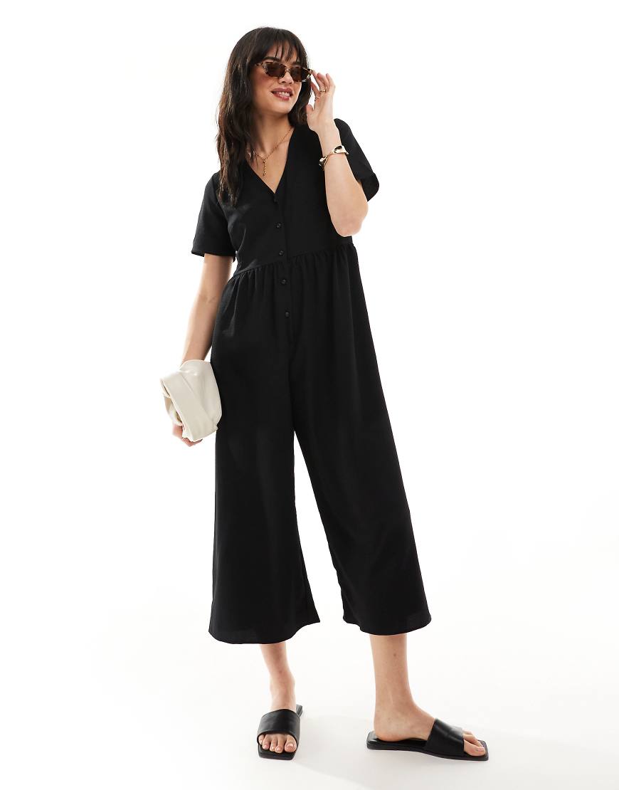 ASOS DESIGN - Kurzärmliger Freizeit-Jumpsuit in Schwarz ASOS DESIGN - Kurzärmliger Freizeit-Jumpsuit in Schwarz von ASOS DESIGN