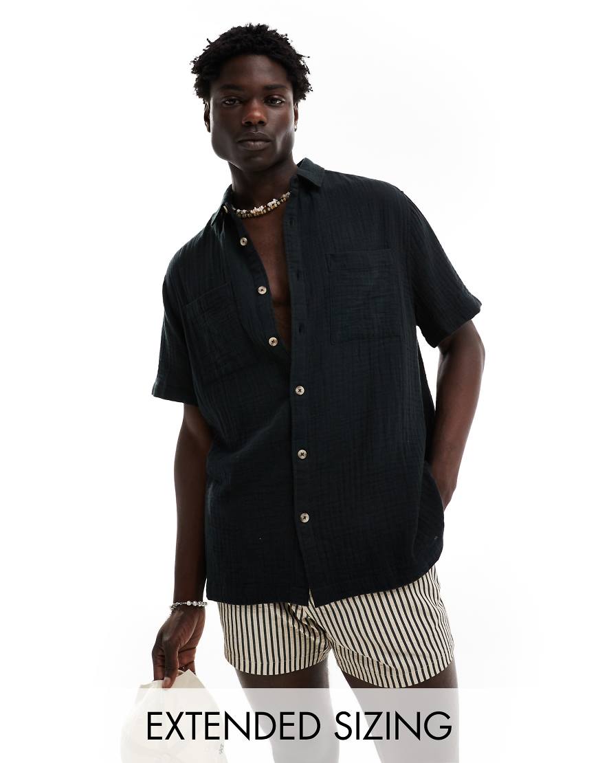 ASOS DESIGN - Kurzärmliges Hemd in Schwarz mit lässigem Schnitt und Reverskragen von ASOS DESIGN
