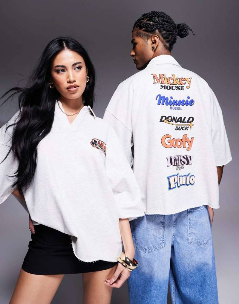 ASOS DESIGN - Kurzärmliges Unisex-Polohemd in Weiß mit extremer Oversize-Passform und aufgestickten Disney-Logos von ASOS DESIGN