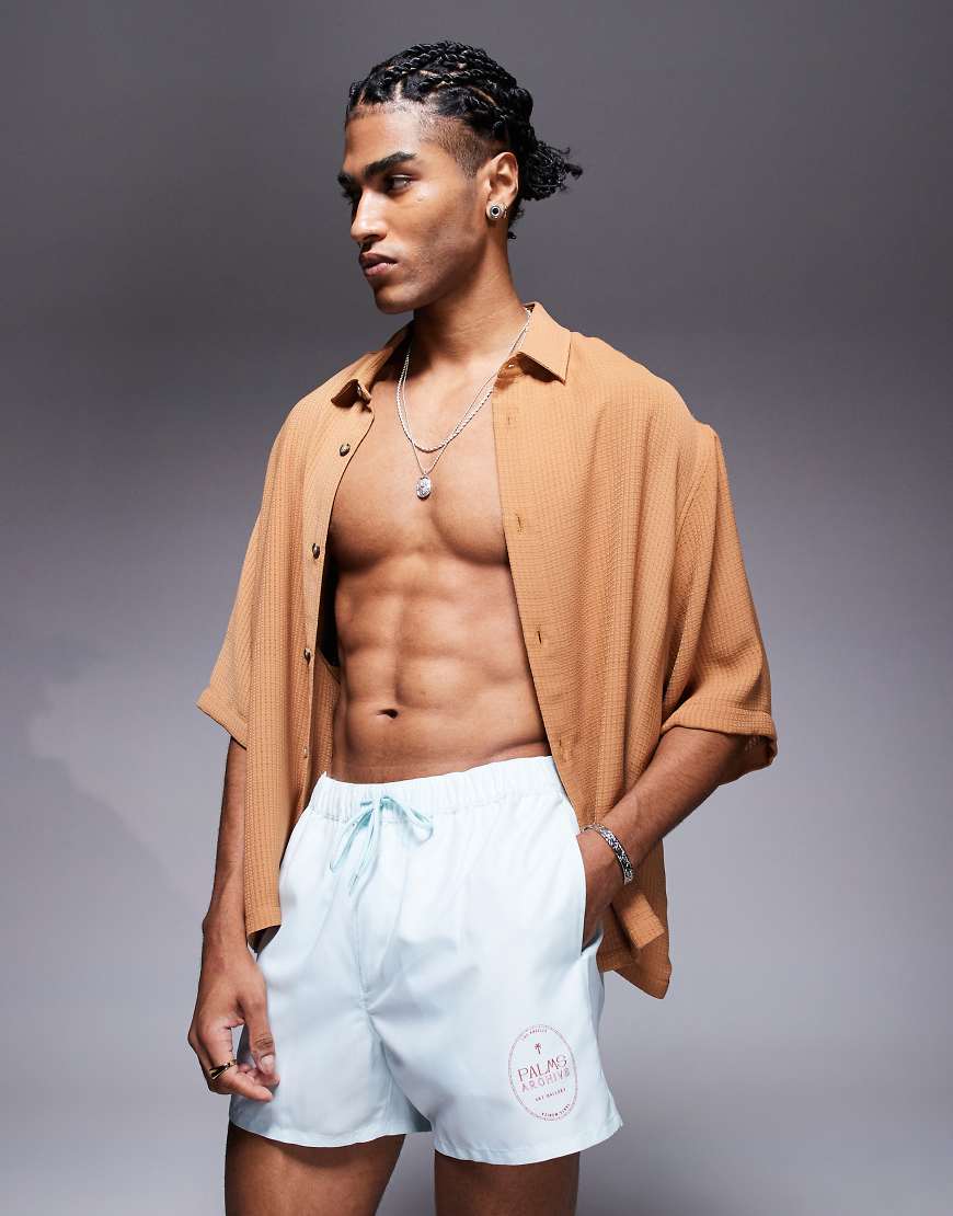 ASOS DESIGN - Kurze, gestreifte Badeshorts in Blau und Weiß von ASOS DESIGN