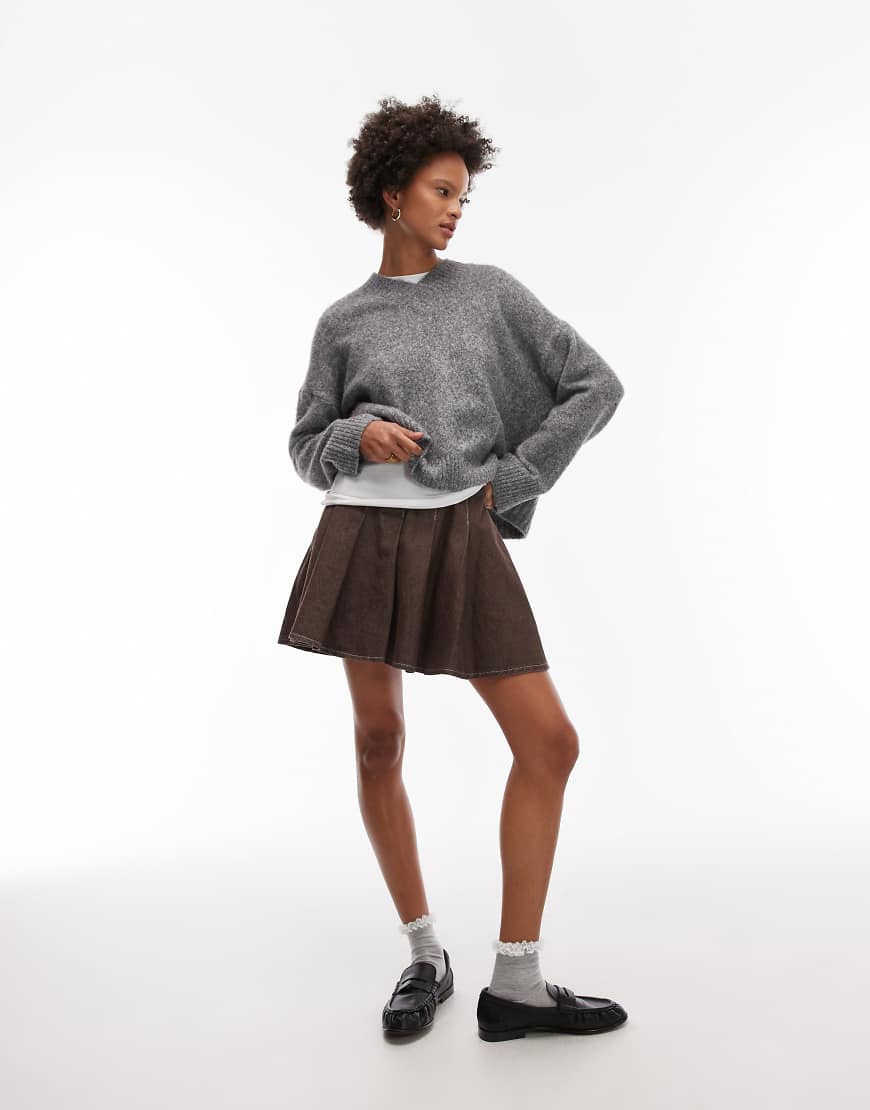 ASOS DESIGN - Kurzer Jeans-Faltenrock in Braun-Brown ASOS DESIGN - Kurzer Jeans-Faltenrock in Braun-Brown von ASOS DESIGN