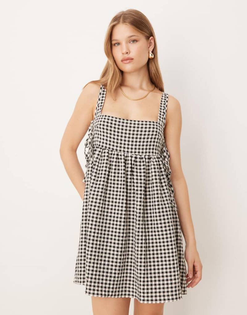 ASOS DESIGN - Kurzes Babydollkleid mit schwarzem Vichykaromuster und seitlicher Schnürung-Bunt ASOS DESIGN - Kurzes Babydollkleid mit schwarzem Vichykaromuster und seitlicher Schnürung-Bunt von ASOS DESIGN