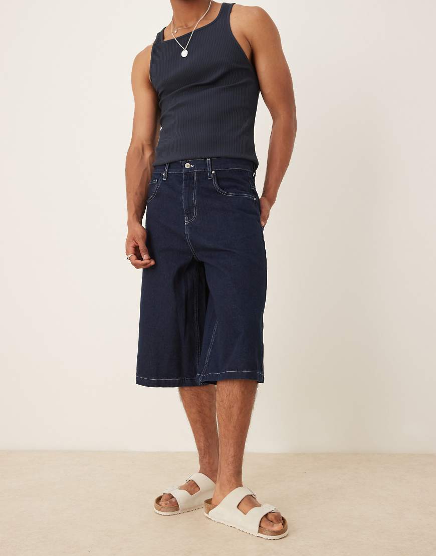 ASOS DESIGN - Länger geschnittene Jeans-Jorts in Indigoblau ASOS DESIGN - Länger geschnittene Jeans-Jorts in Indigoblau von ASOS DESIGN