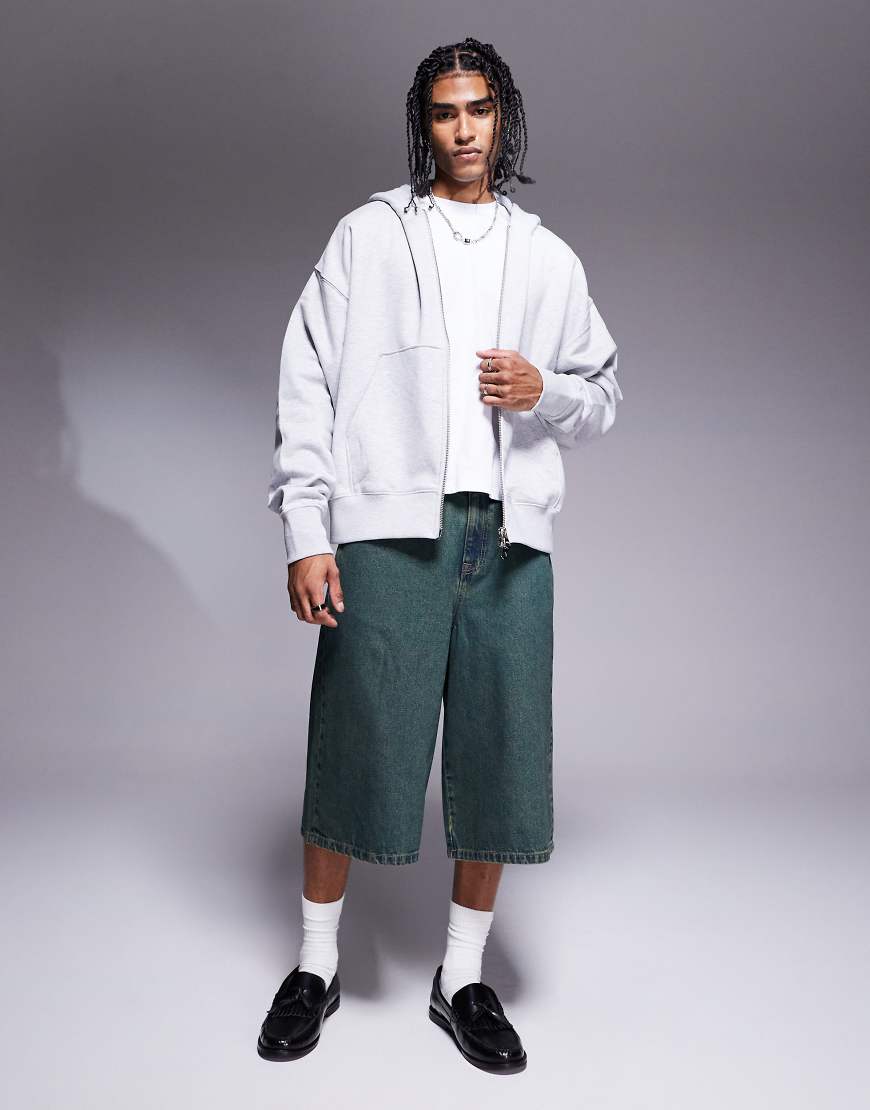 ASOS DESIGN - Länger geschnittene Jeans-Jorts in dunkelblauer Waschung mit Farbstich ASOS DESIGN - Länger geschnittene Jeans-Jorts in dunkelblauer Waschung mit Farbstich von ASOS DESIGN