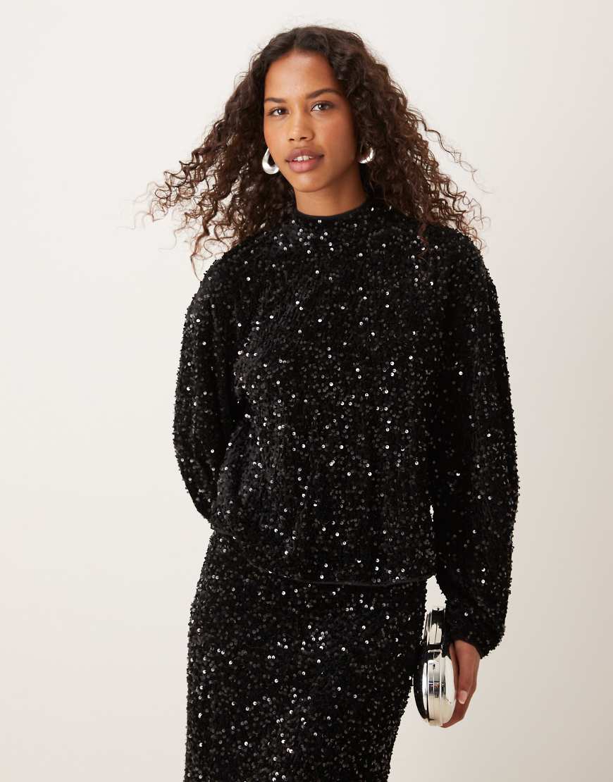 ASOS DESIGN - Langärmlige Samt-Bluse in Schwarz mit Rückenausschnitt und Paillettenbesatz, Kombiteil ASOS DESIGN - Langärmlige Samt-Bluse in Schwarz mit Rückenausschnitt und Paillettenbesatz, Kombiteil von ASOS DESIGN