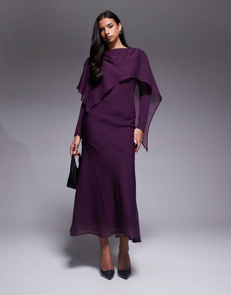 ASOS DESIGN - Langärmliges, asymmetrisches Maxikleid mit Cape-Overlay in Pflaume-Lila ASOS DESIGN - Langärmliges, asymmetrisches Maxikleid mit Cape-Overlay in Pflaume-Lila von ASOS DESIGN