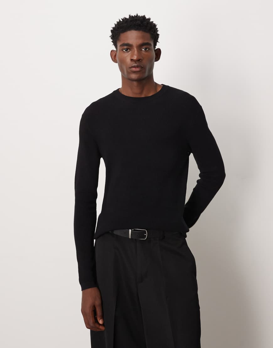 ASOS DESIGN - Langärmliges, körperbetontes Strick-T-Shirt in Schwarz mit Rundhalsausschnitt von ASOS DESIGN