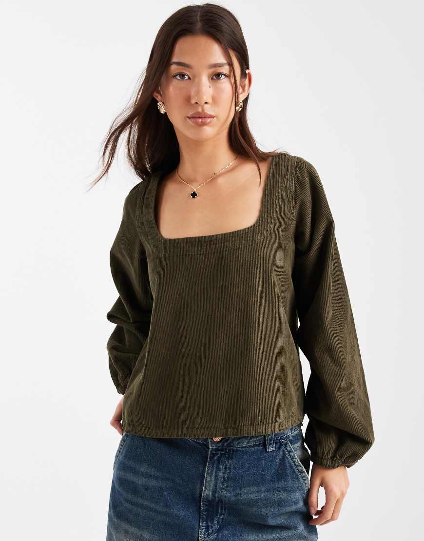 ASOS DESIGN - Langärmliges Babydoll-Oberteil aus Cord in Khaki-Grün ASOS DESIGN - Langärmliges Babydoll-Oberteil aus Cord in Khaki-Grün von ASOS DESIGN