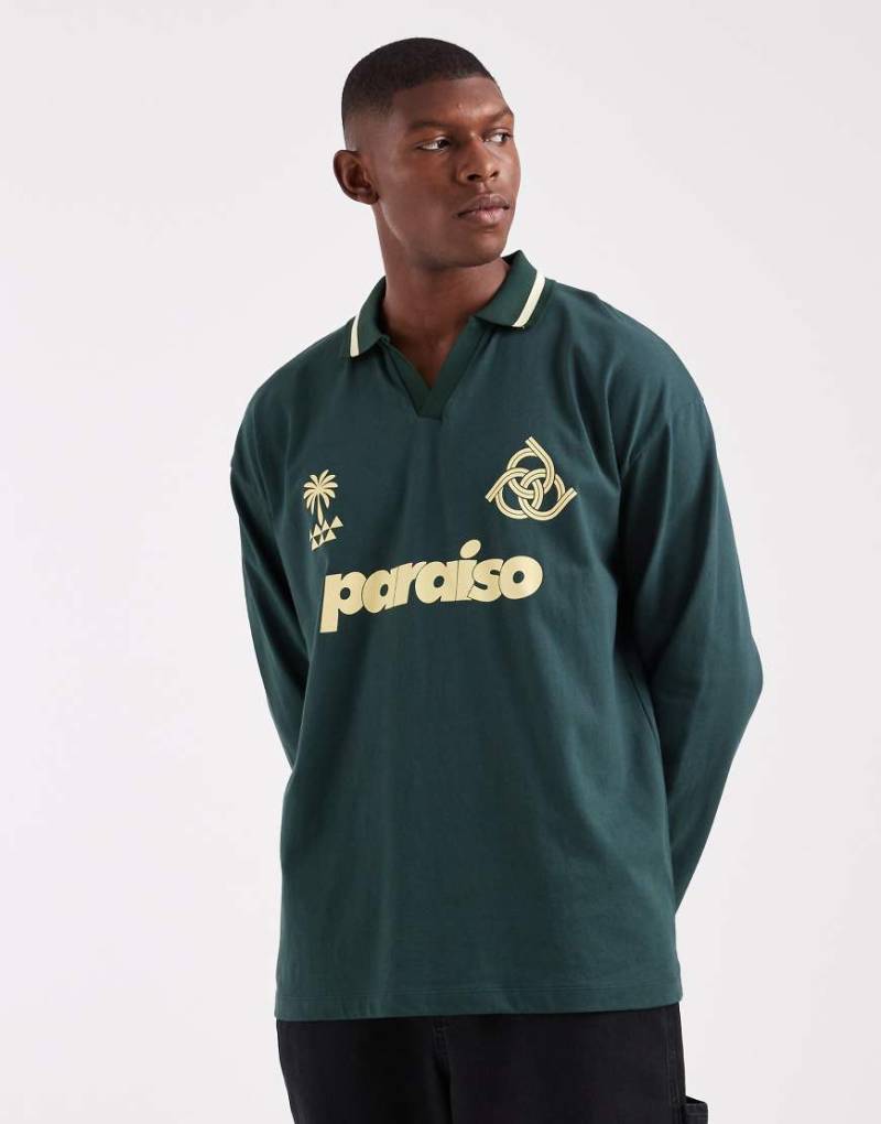 ASOS DESIGN - Langärmliges Oversize-Polohemd mit „Paraiso"-Grafik in Dunkelgrün von ASOS DESIGN